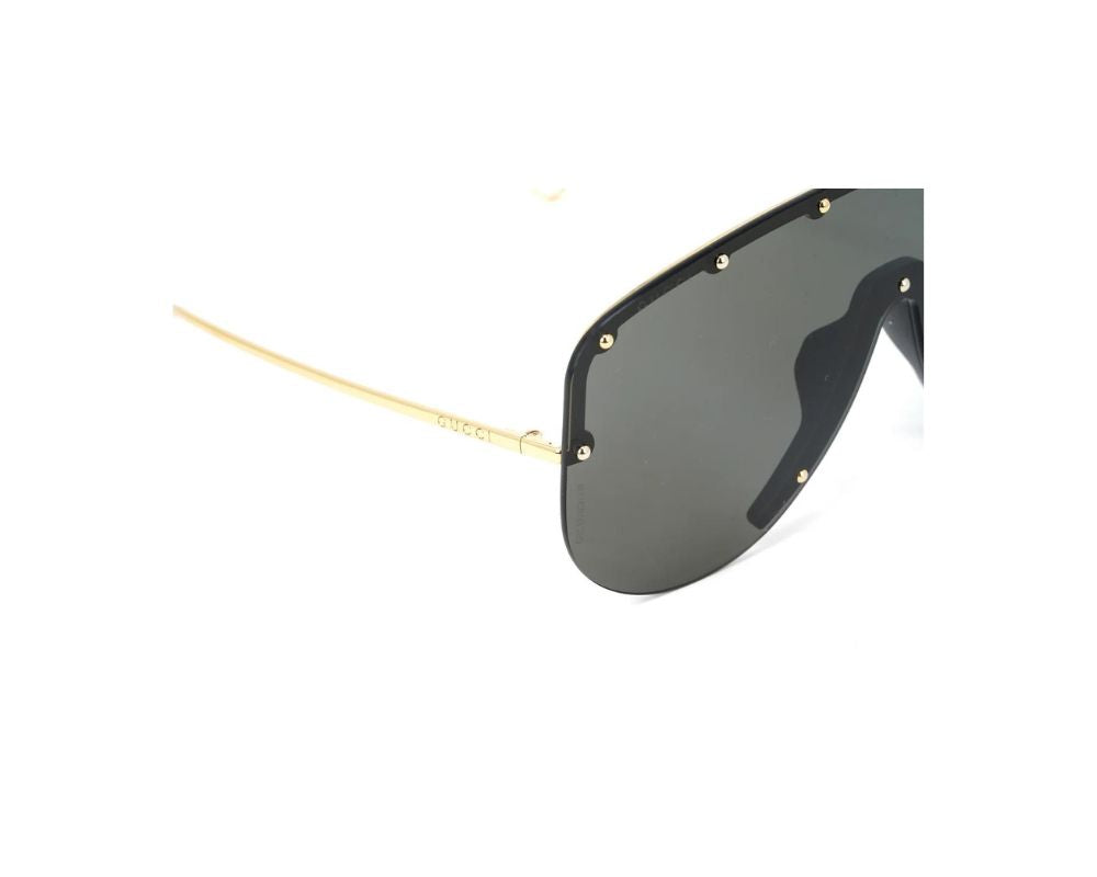 Gucci GG0667S 001 Sunglasses: A Chic Look